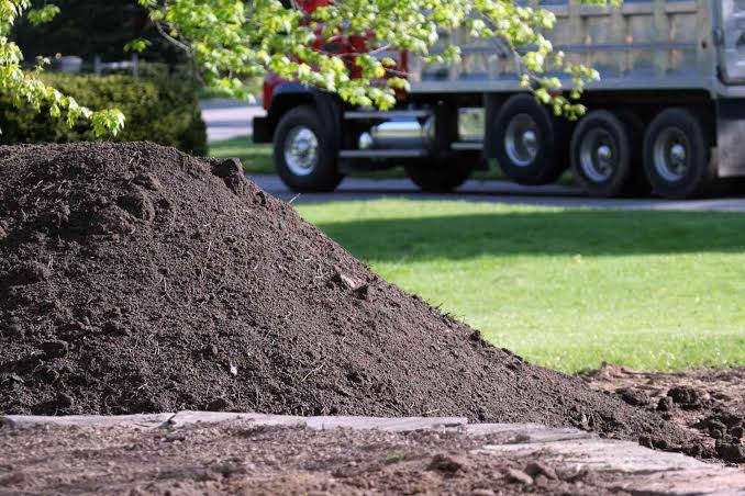Topsoil, Fill Dirt, or Sand What to Use for Yard Grading