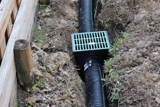 When a Catch Basin Solves a Yard Drainage Problem