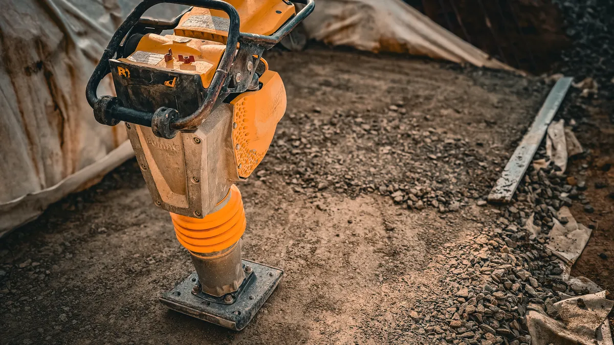 Jumping jack tamper on soil