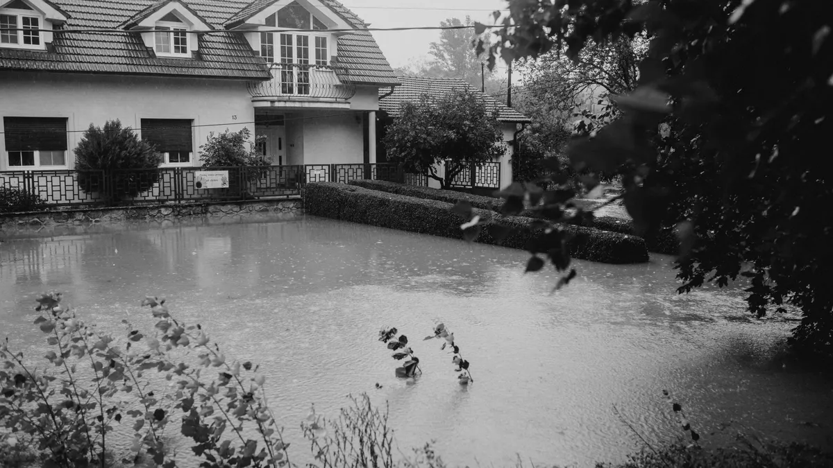 House yard flooded with standing water